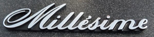 Silver Plastic Badge - Millesime. 96 102 197